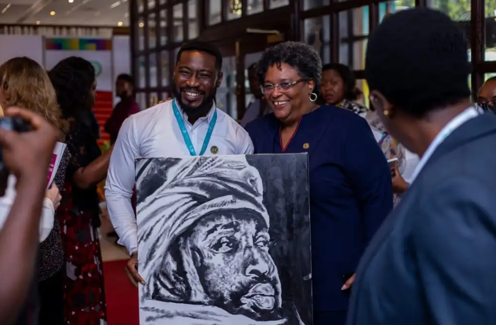Celebrated Ghanaian Artist Patrick William Dodoo Engages with Barbados Prime Minister Mia Mottley, Advocating for Art and National Progress