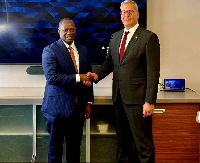 Emmanuel Armah-Kofi Buah (L) and Egypt's Karim Badawi (R)