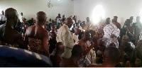 Some NPP executives kneeling before Asantehene, Otumfuo Osei Tutu II