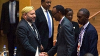 Morocco's King Mohammed VI exchanging greetings with the president of Rwanda