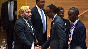 Morocco's King Mohammed VI exchanging greetings with the president of Rwanda