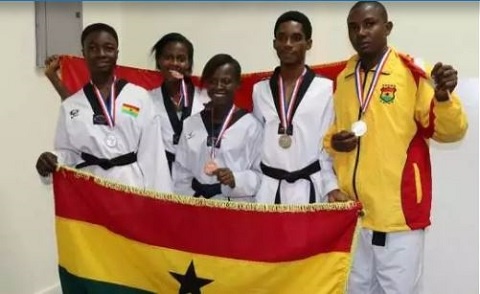 Ghana's reps displaying their medals