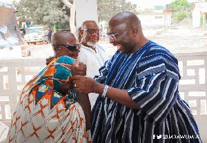 Dr Mahamudu Bawumia interacting with some of the beneficiaries