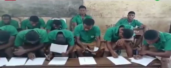 A screenshot of students sharing mono desk at Ekumfi Ameyaw SHS