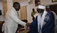 IGP David Asante-Apeatu congratulates the National Chief Imam, Sheik Osman Nuhu Sharabutu