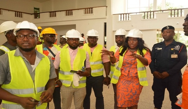 Catherine Afeku (second right) at the site of the Eastern Regional Theatre Complex