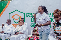 Reverend Latifa Adekanla (with mic) speaking at the event
