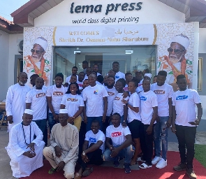 A group picture of employees at Lema Press, Sheikh Armiyaw Shaibu, and Alhaji Latif Abdulsalam