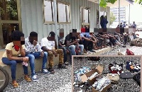 Some of the suspected robbers lined up after the arrest with insert of Some of the items retrieved
