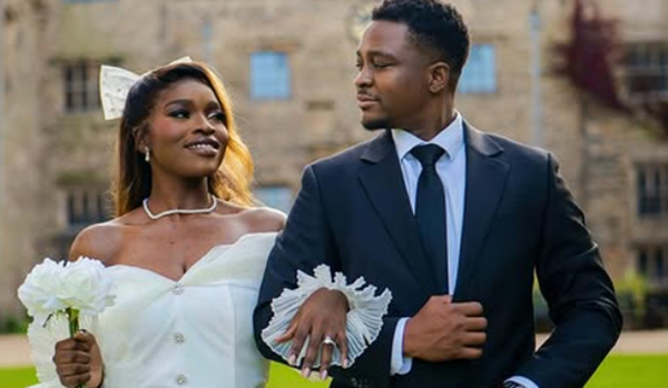 Singer Krymi and wife (pictured) has caused a stir online with romantic wedding photos