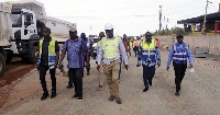 Kwasi Amoako-Attah inspected the progress of work at the site with others