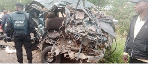 A mangled bus at the accident scene at Akuse Junction