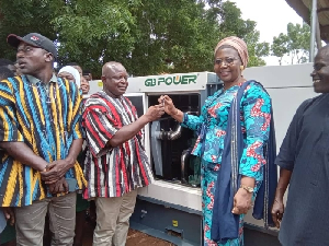 The MCEs Presenting The Gen Set To Shelley Issah On Behalf Of The Energy Minister