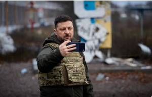 Ukraine's President Volodymyr Zelenskyy recording a video message at the entrance to Kupiansk