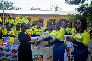 A Headmistress Receiving Items From Newmont BRG 0