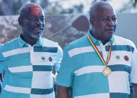 Kofi Amoabeng (L) and  President John Dramani Mahama (R)