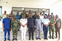 The Lands Minister and the Chief of Defense Staff in a pose with other officials