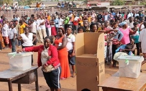 Voters queue to cast vote.         File photo.