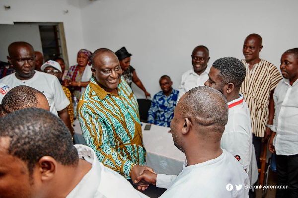 Alan Kyerematen in a handshake with some NPP delegates in the Ashanti Region