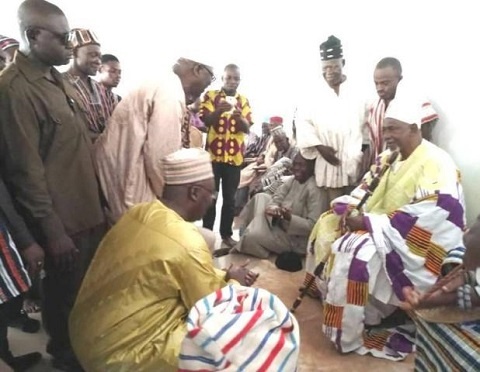 Vice President Dr Mahamudu Bawumia kneeling before the chief