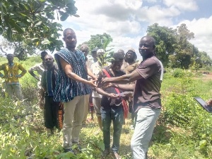 Representative of the farmers receiving the seedlings on behalf of the all the 100 farmers