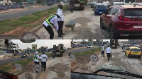 Two MTTD officers were seen filling potholes on a busy highway