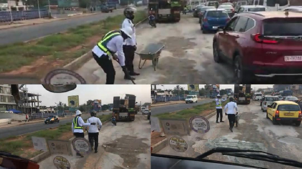 Netizens react as Police officers were spotted fixing potholes on a highway
