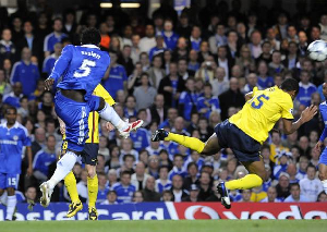 Essien (in blue) scored with a powerful shot against Barcelona