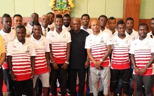 Former President John Dramani Mahama with Black Stars players