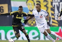 Afful in a tussle with Didier Drogba