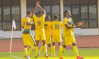 Tamale City players celebrate a goal