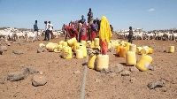 People queue for water in drought-hit Northern Kenya