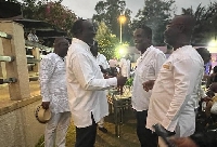 Alan Kyerematen confers with Kwesi Pratt and other guests