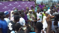 Chief Imam, Sheikh Sharubutu hands over the trophy to the winners