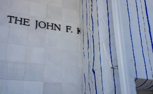 A tarp covers the name of the John F Kennedy Center for the Performing Arts in Washington, DC, US