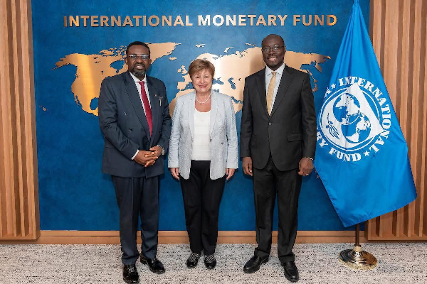Dr Cassiel Ato Forson (R) Dr Johnson Asiama (L) and IMF boss Kristalina Georgiva (M)