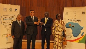 Deputy Information Minister, Kojo Oppong-Nkrumah received the mantle on behalf of Ghana