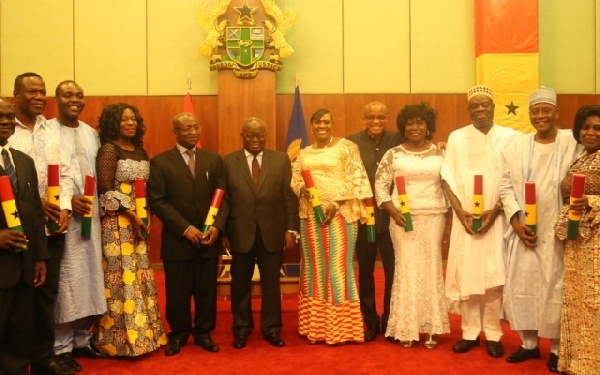 File photo of president with appointees during a swearing in event.