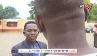 The Nigerian man (with face turned to the camera) speaking to GHOne TV's Murtala Inusah