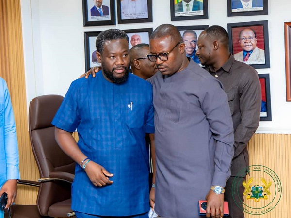 Minister of Energy and Green Transition, John Jinapor (R) and BOST MD Afetsi Awoonor (L)