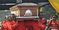 Pallbearers carrying the casket containing the remains of the late Asantehemaa for burial