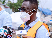 Ricky Anokye Frimpong, Greater Accra Regional Manager of Zoomlion speaking to the medi
