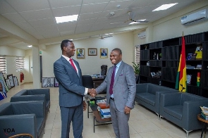 Minister of Education, Yaw Osei Adutwum with new Acting Director General of the GES, Eric Nkansah
