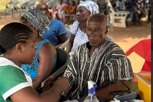 A man is seen receiving medical care