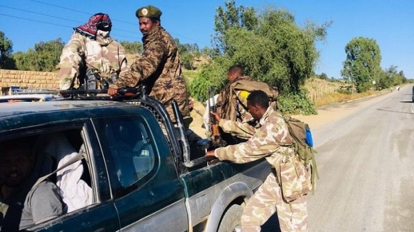 The leader of the Tigray region said his forces fired rockets at neighboring Eritrea