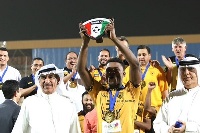 Ghana defender Rashid Sumaila lifting the championship trophy