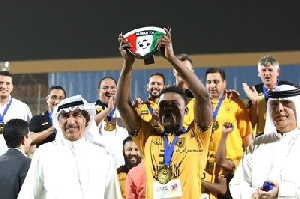 Ghana defender Rashid Sumaila lifting the championship trophy
