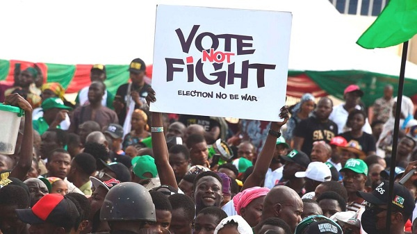 A political supporter holds a placard during a campaign rally in Ibadan, southwestern Nigeria