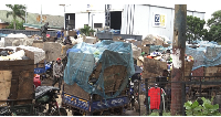 Loaded refuse tricycles queue at Achimota transfer station
