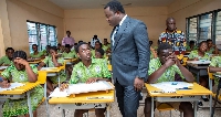 Rev. John Ntim Fordjour interacting with BECE candidates at the St. Thomas Aquinas SHS